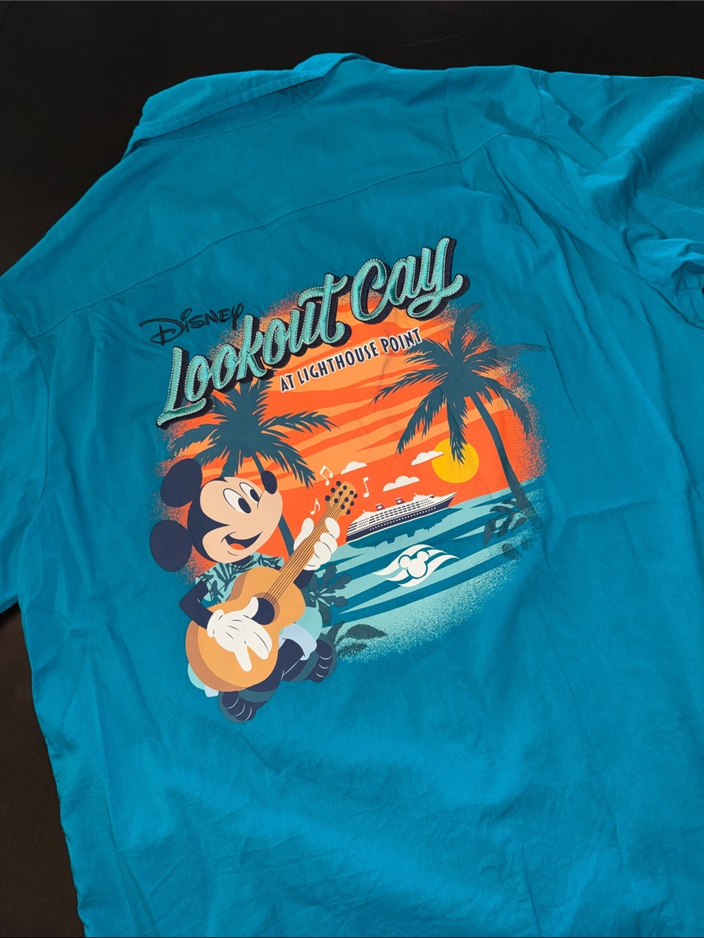 Disney Cruise Line Lookout Cay Teal Mickey Guitar Sunset Graphic Tee